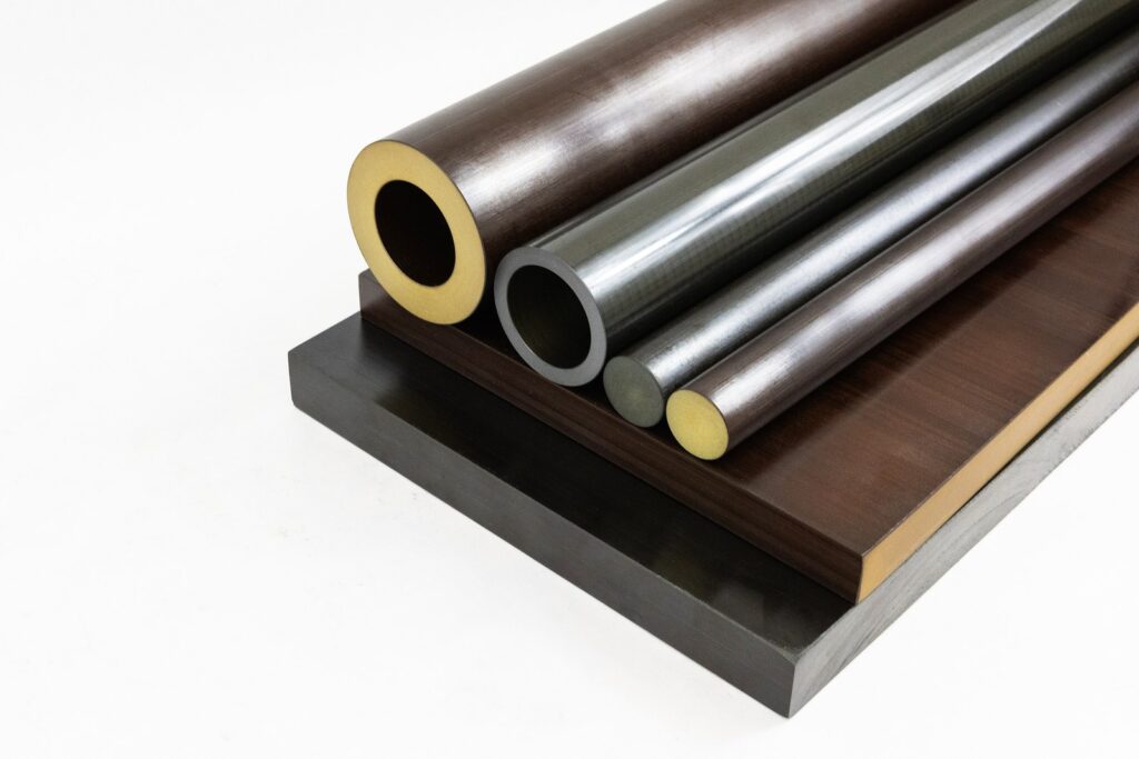 图中展示了Torlon Seamless Tube，旁边是Torlon棒材和板材等标准型材
